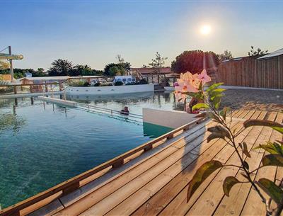 sandy lagoon with swimming lane and balneotherapy area