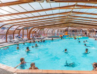 aquatic area with indoor heated swimming pool