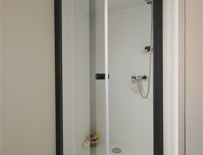 Shower in a mobile home at a Yelloh! Village in Vendée