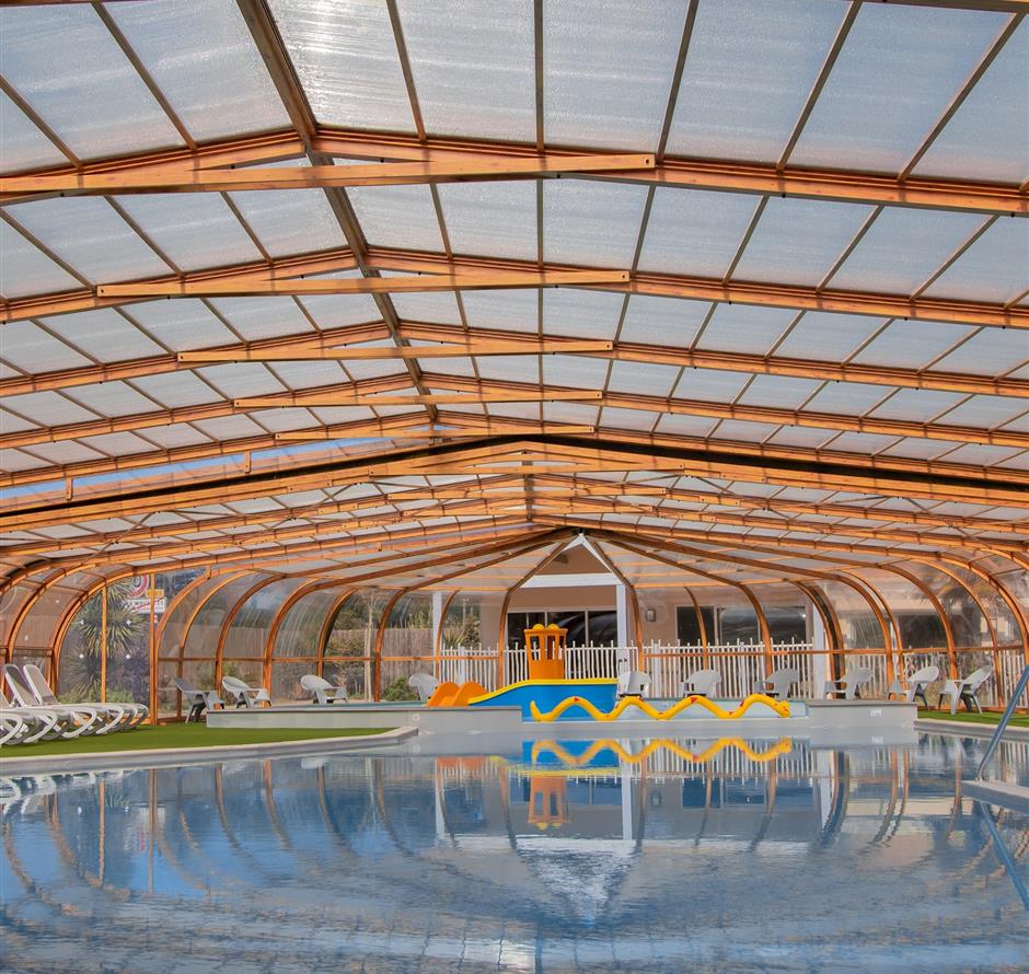 Indoor heated swimming pool at Yelloh! Village La Pomme de Pin campsite - ST HILAIRE DE RIEZ CAMPSITE